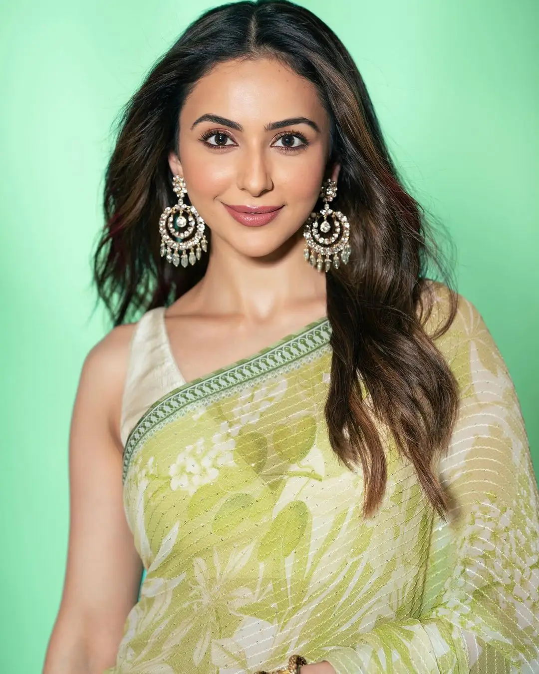 Rakul Preet Singh Wearing Beautiful Earrings Green Saree Sleeveless Blouse